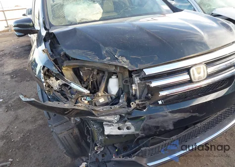 2018 Honda Pilot Touring z USA, uszkodzony, nr VIN 5FNYF5H90JB008586